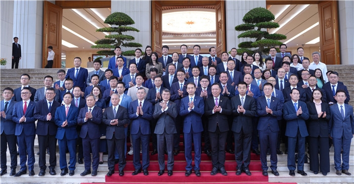 Các đại biểu chụp ảnh lưu niệm. Ảnh: Bạch Hiểu Xuyên - Phóng viên Nhân Dân nhật báo điện tử